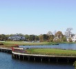 Tulips adorn the bridge and tee box on the par-4 finishing hole at Baywood Greens.