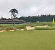 The view of the clubhouse from the 16th green at Poppy Hills Golf Course. 