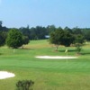 A view of a hole protected by bunkers at Magnolia Springs Golf